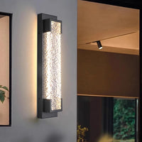 Applique acier inoxydable installée sur une façade
